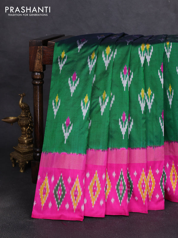 Pochampally silk saree green and pink with allover ikat woven buttas and zari woven ikat butta border