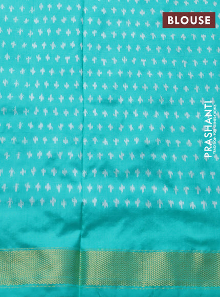 Pochampally silk saree teal green and cream with allover ikat weaves and ikat woven buttas & zari woven border
