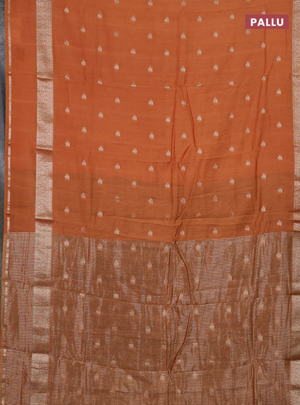 Semi chanderi saree rust shade and black with allover zari woven buttas and rettapet zari woven border