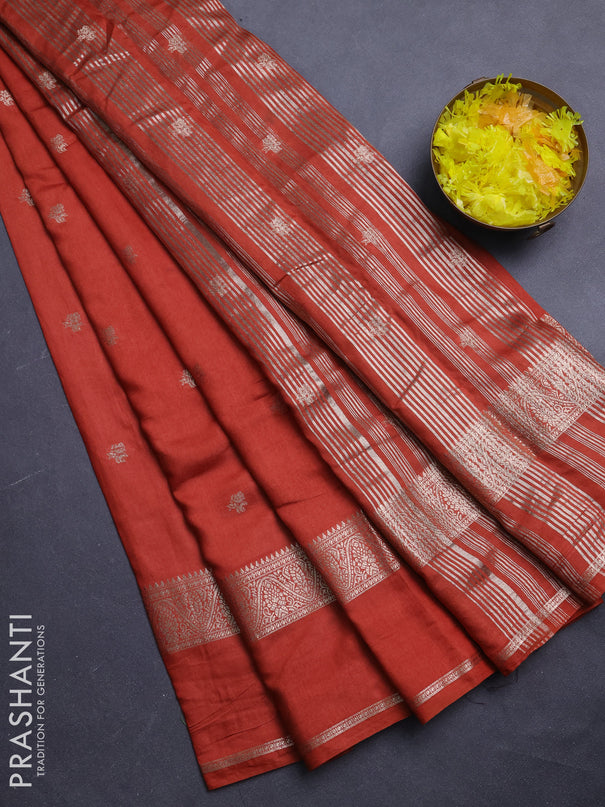 Semi chanderi saree rust shade and deep jamun with allover zari woven buttas and rettapet zari woven border