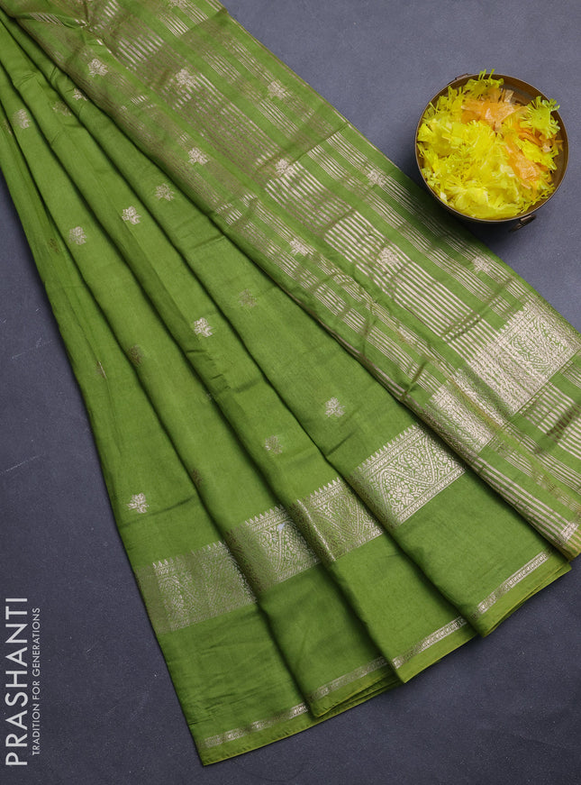 Semi chanderi saree light green and violet with allover zari woven buttas and rettapet zari woven border