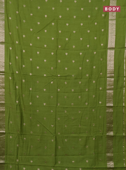 Semi chanderi saree light green and violet with allover zari woven buttas and rettapet zari woven border