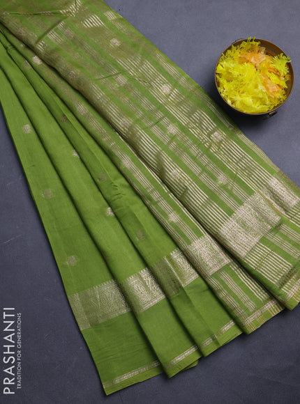 Semi chanderi saree light green and violet with allover zari woven buttas and rettapet zari woven border