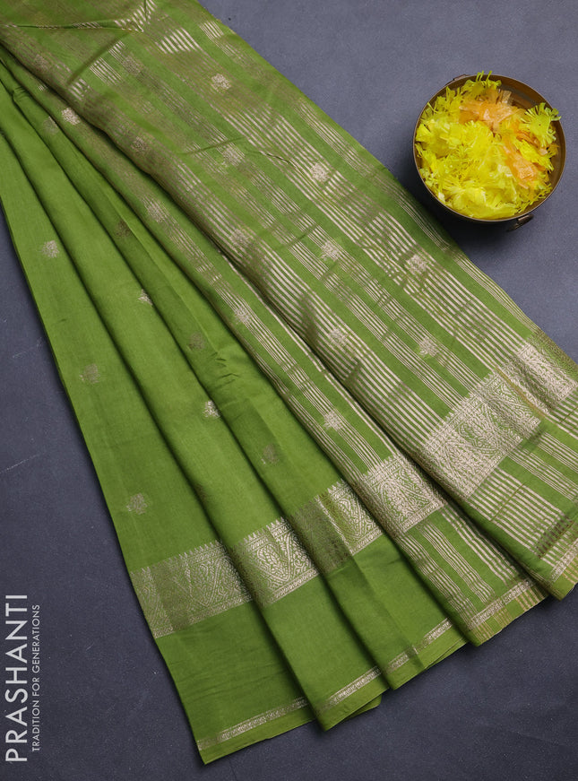 Semi chanderi saree light green and violet with allover zari woven buttas and rettapet zari woven border