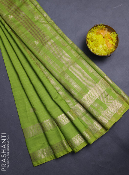 Semi chanderi saree light green and violet with allover zari woven buttas and rettapet zari woven border