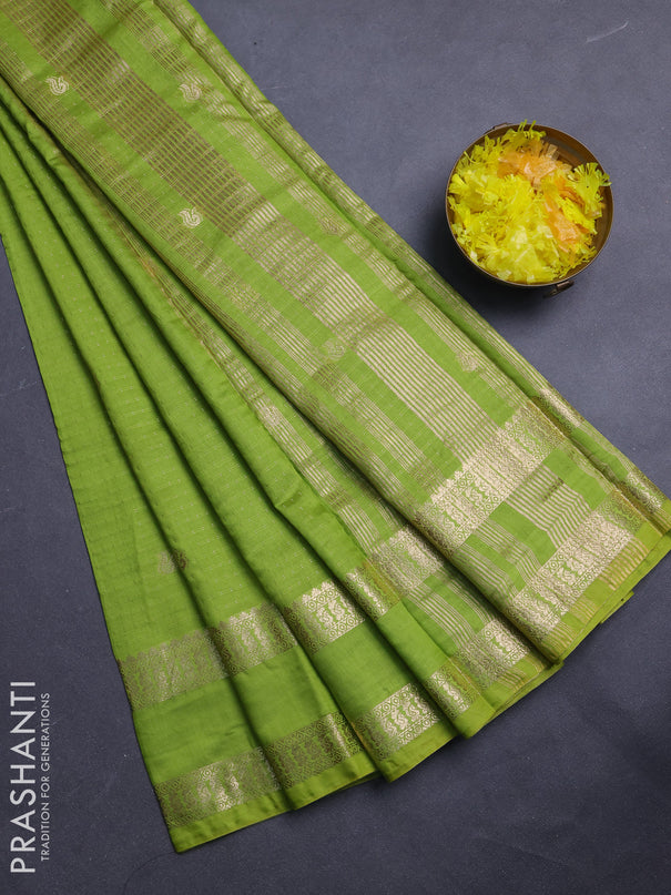 Semi chanderi saree light green and violet with allover zari woven buttas and rettapet zari woven border