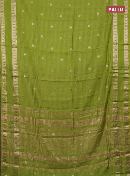 Semi chanderi saree light green and violet with allover zari woven buttas and rettapet zari woven border