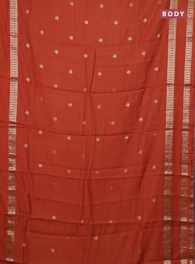 Semi chanderi saree rust shade and black with allover zari woven buttas and rettapet zari woven border