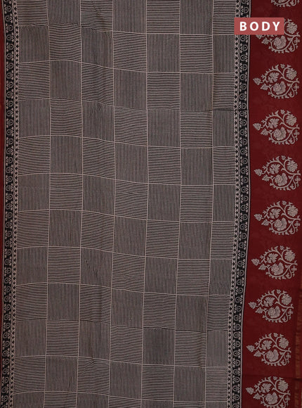 Chanderi Bagru saree black and rust shade with geometric prints and small zari woven border