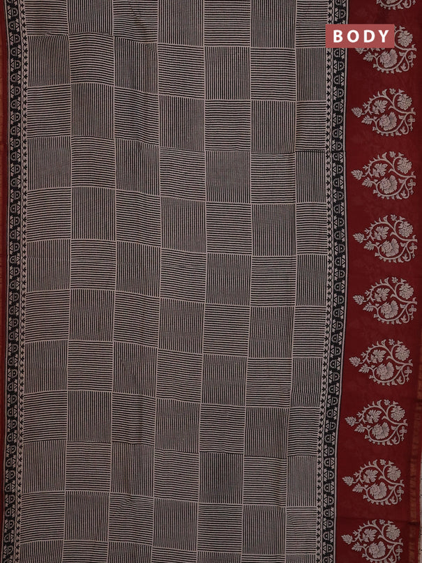 Chanderi Bagru saree black and rust shade with geometric prints and small zari woven border