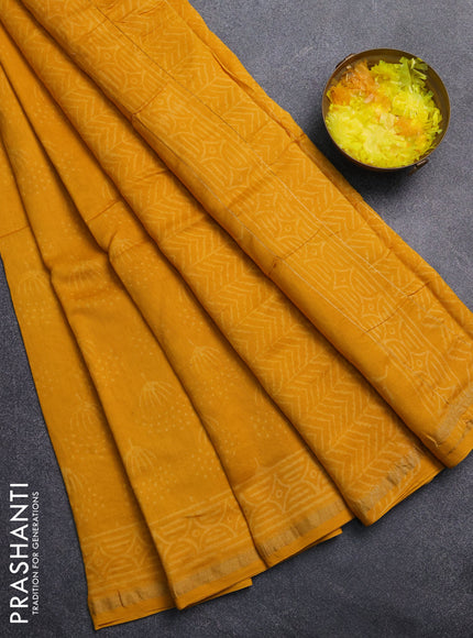 Chanderi Bagru saree yellow with allover butta prints and zari woven border