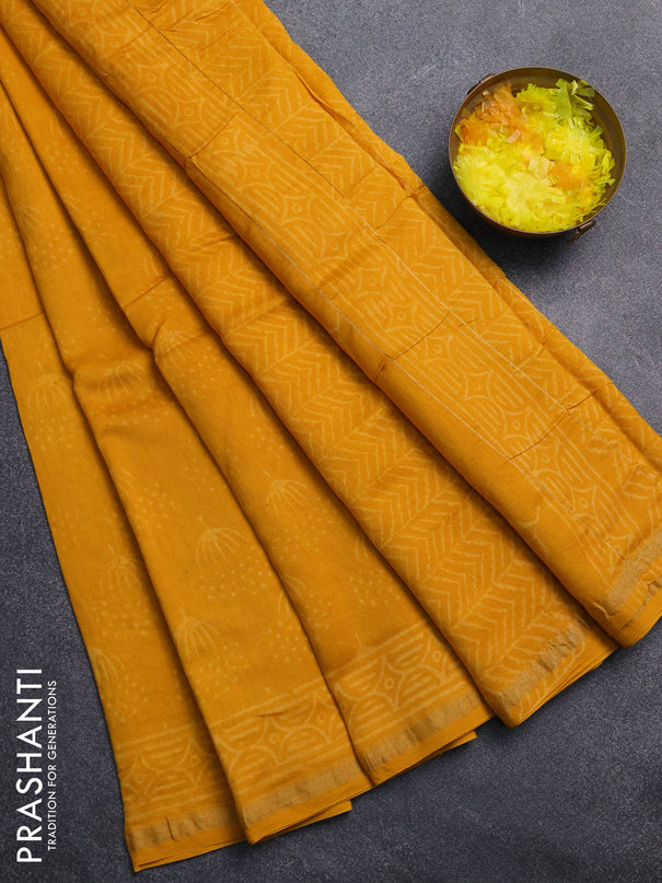 Chanderi Bagru saree yellow with allover butta prints and zari woven border