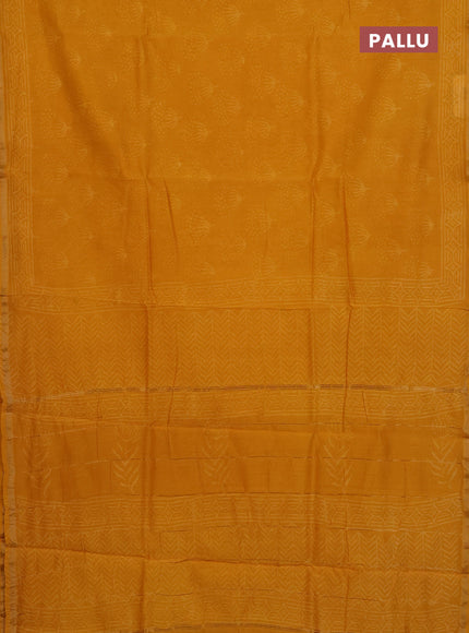 Chanderi Bagru saree yellow with allover butta prints and zari woven border