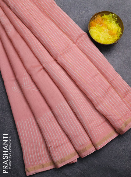 Chanderi Bagru saree peach shade with allover geometric prints and small zari woven border