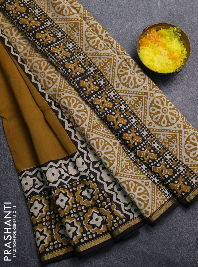 Chanderi Bagru saree dark mustard and black with plain body and small zari woven border