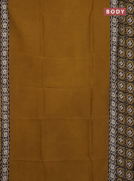Chanderi Bagru saree dark mustard and black with plain body and small zari woven border