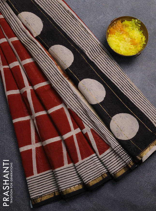 Chanderi Bagru saree rust shade and black with allover geometric prints and zari woven border