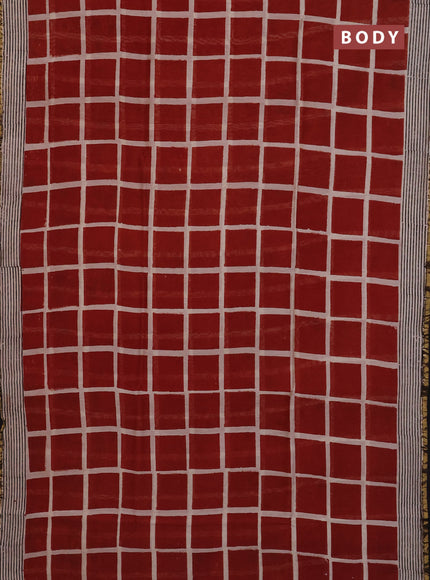 Chanderi Bagru saree rust shade and black with allover geometric prints and zari woven border