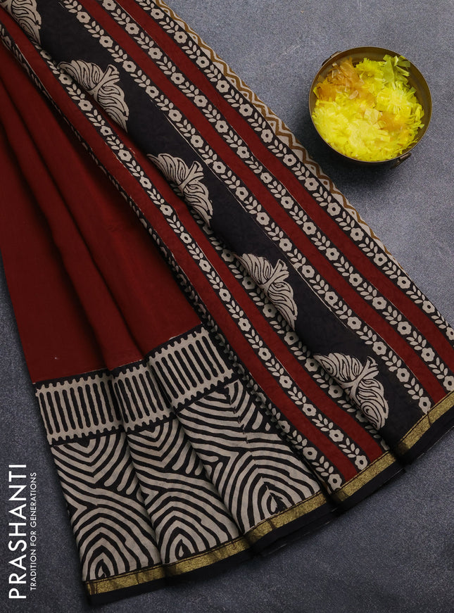 Chanderi Bagru saree rust shade and black with plain body and printed small border