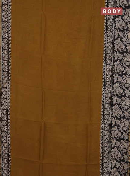 Chanderi Bagru saree dark mustard and black with plain body and small zari woven border