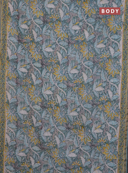 Chanderi Bagru saree teal green and yellow with allover prints and small zari woven border