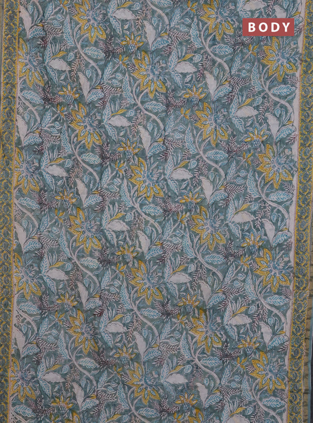 Chanderi Bagru saree teal green and yellow with allover prints and small zari woven border