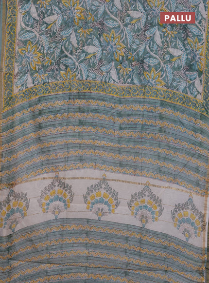 Chanderi Bagru saree teal green and yellow with allover prints and small zari woven border