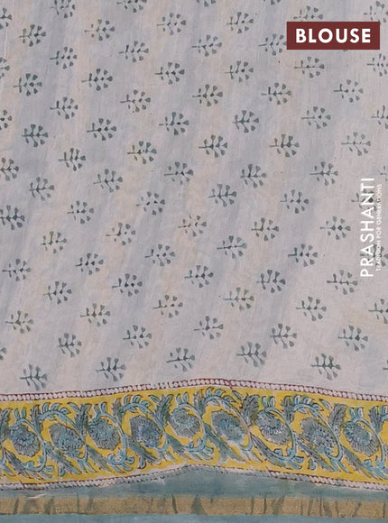 Chanderi Bagru saree teal green and yellow with allover prints and small zari woven border