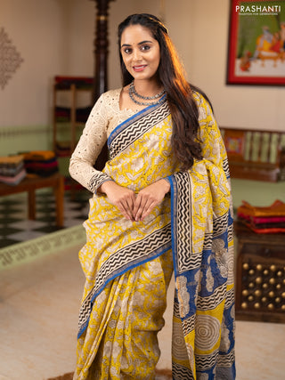 Chanderi Bagru saree yellow and blue with allover prints and small zari woven border