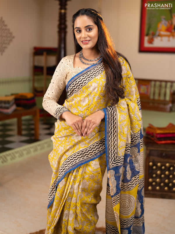 Chanderi Bagru saree yellow and blue with allover prints and small zari woven border
