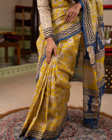 Chanderi Bagru saree yellow and blue with allover prints and small zari woven border