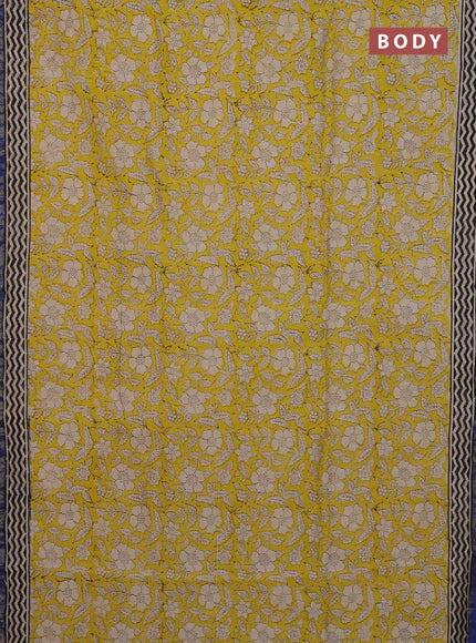 Chanderi Bagru saree yellow and blue with allover prints and small zari woven border