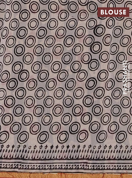Chanderi Bagru saree black and rustic maroon with allover geometric prints and small zari woven border