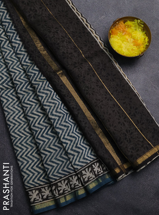 Chanderi Bagru saree peacock green with allover zigzag prints and small zari woven border