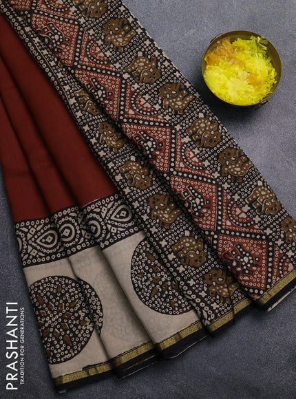 Chanderi Bagru saree rustic orange and black with plain body and small zari woven border