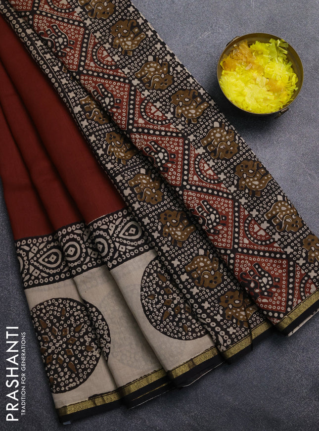 Chanderi Bagru saree rustic orange and black with plain body and small zari woven border