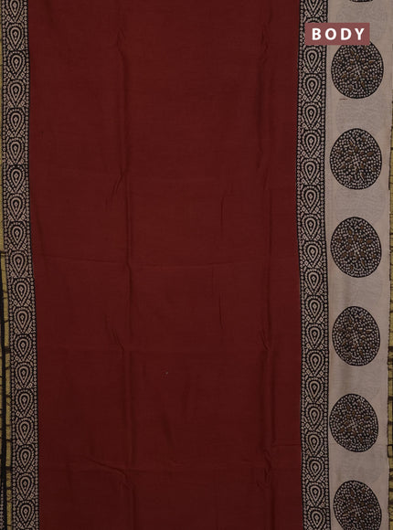 Chanderi Bagru saree rustic orange and black with plain body and small zari woven border