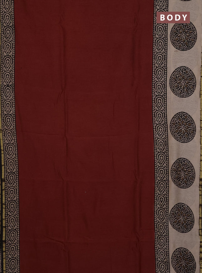 Chanderi Bagru saree rustic orange and black with plain body and small zari woven border