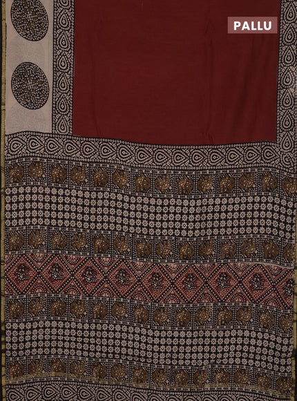Chanderi Bagru saree rustic orange and black with plain body and small zari woven border