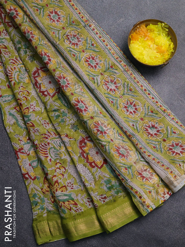 Chanderi Bagru saree light green and beige with allover prints and mageshwari border