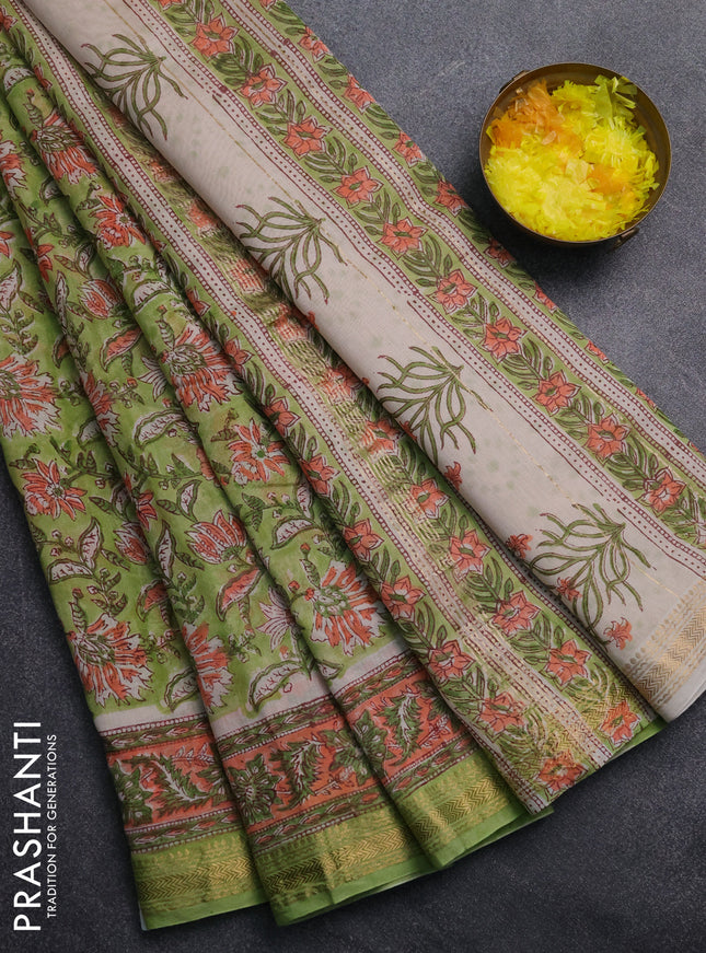 Chanderi Bagru saree light green and orange with allover floral prints and mageshwari border