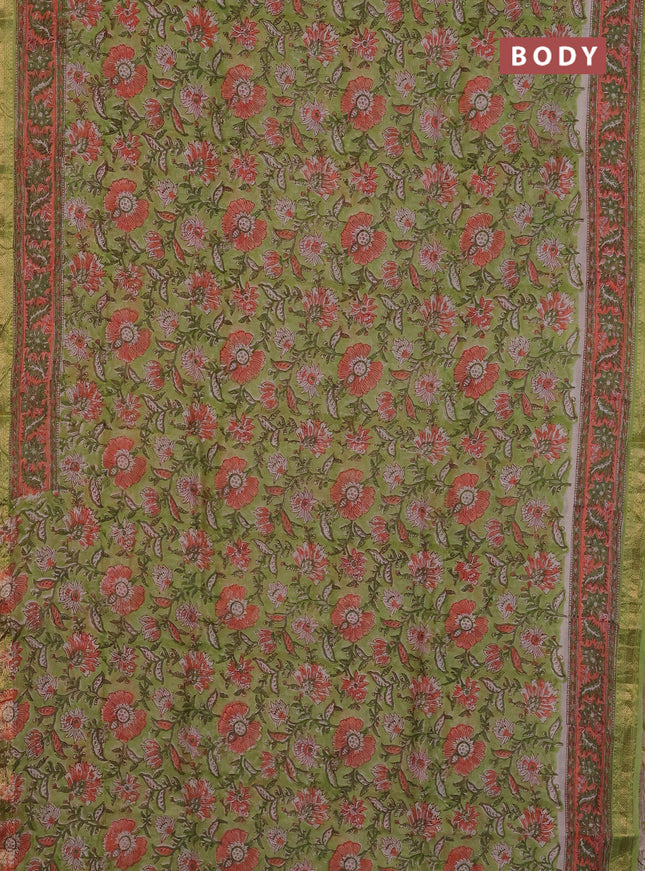 Chanderi Bagru saree light green and orange with allover floral prints and mageshwari border