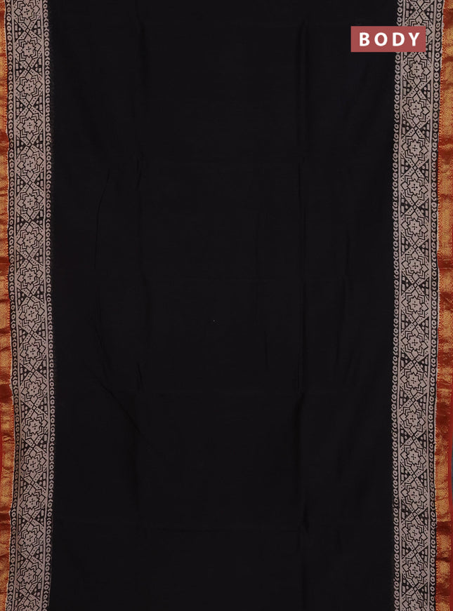 Chanderi Bagru saree black and rust shade with plain body and mageshwari border
