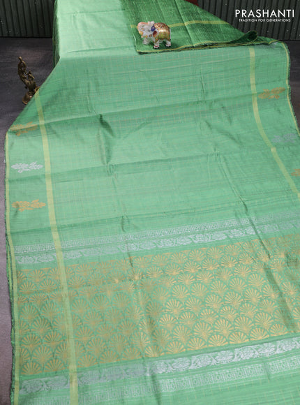 Pure dupion silk saree light green with allover zari checked pattern and rettapet zari woven butta border