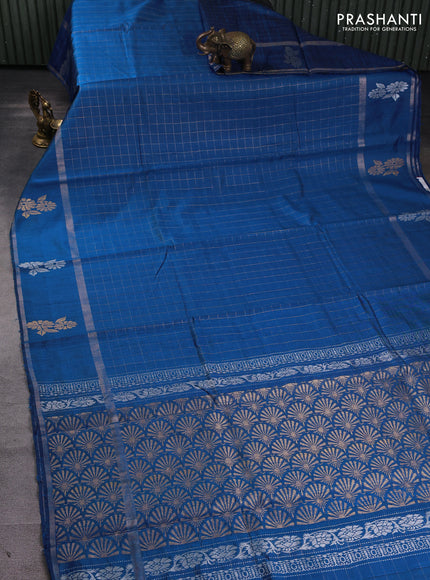 Pure dupion silk saree cs blue with allover zari checked pattern and rettapet zari woven butta border