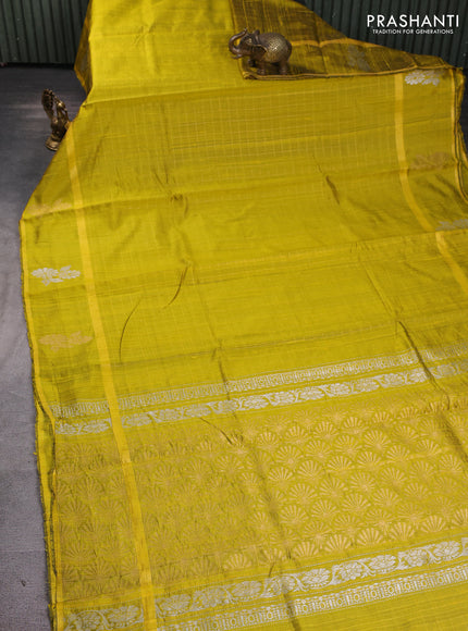 Pure dupion silk saree lime yellow with allover zari checked pattern and rettapet zari woven butta border
