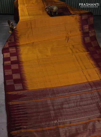 Pure dupion silk saree dark mustard and deep maroon with plain body and temple design zari woven butta border