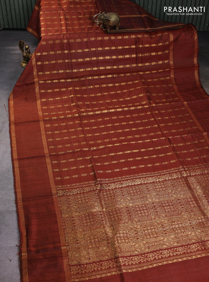 Pure dupion silk saree rustic orange with allover zari woven buttas and rettapet zari woven border