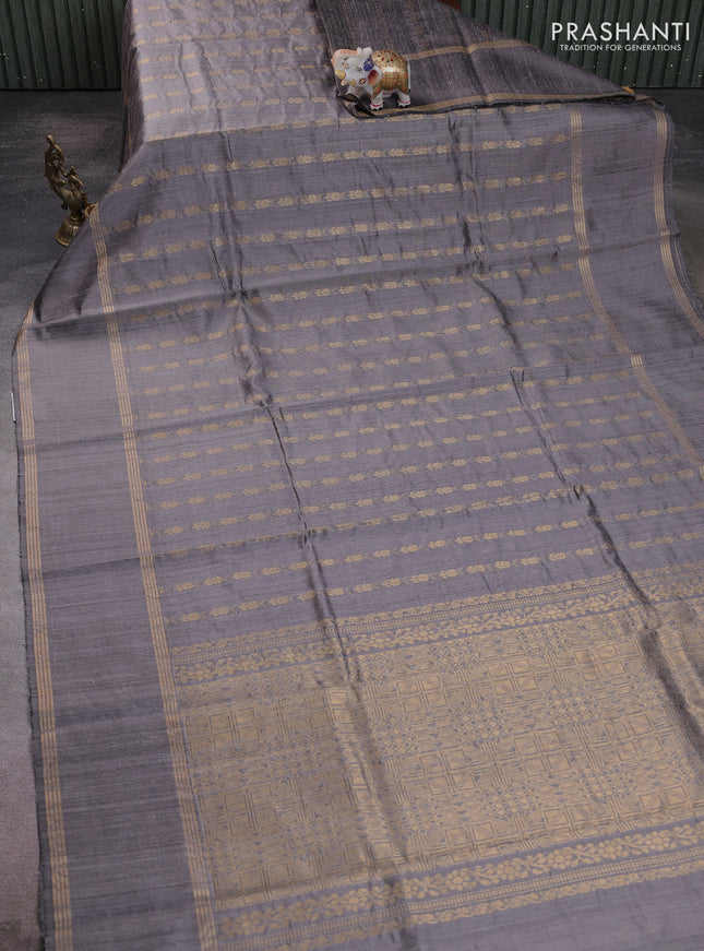 Pure dupion silk saree grey with allover zari woven buttas and rettapet zari woven border