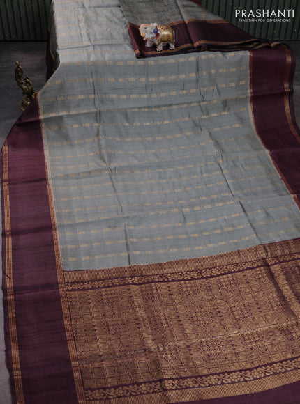 Pure dupion silk saree grey and coffee brown with allover zari woven buttas and rettapet zari woven border